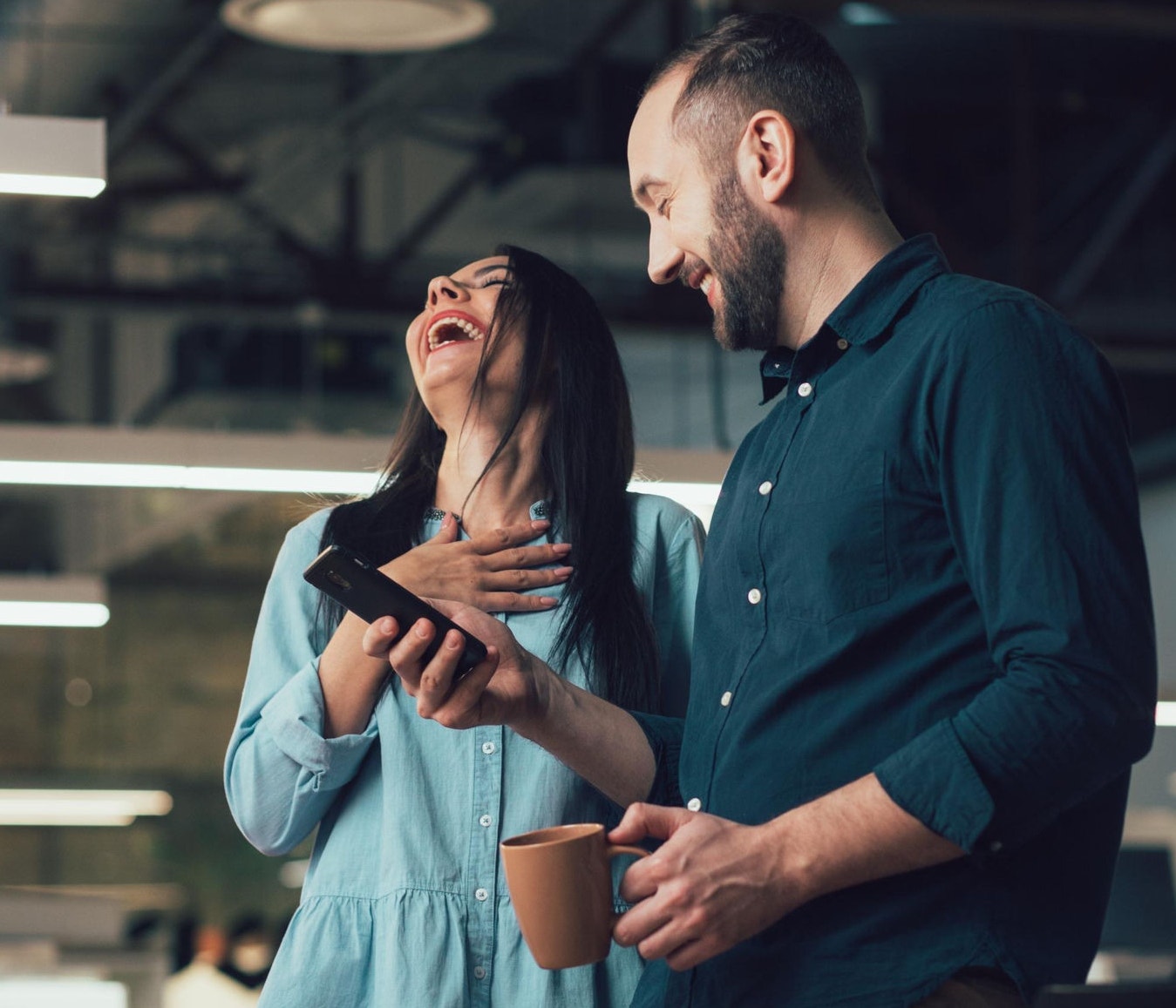 Canva-colleagues-laughing-break-talking