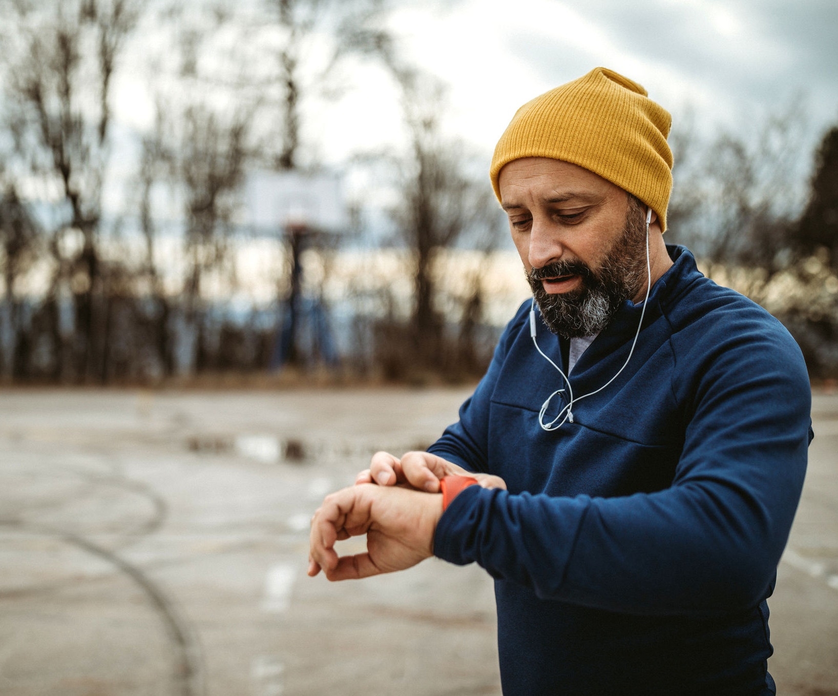 Senior man doing workout on playground