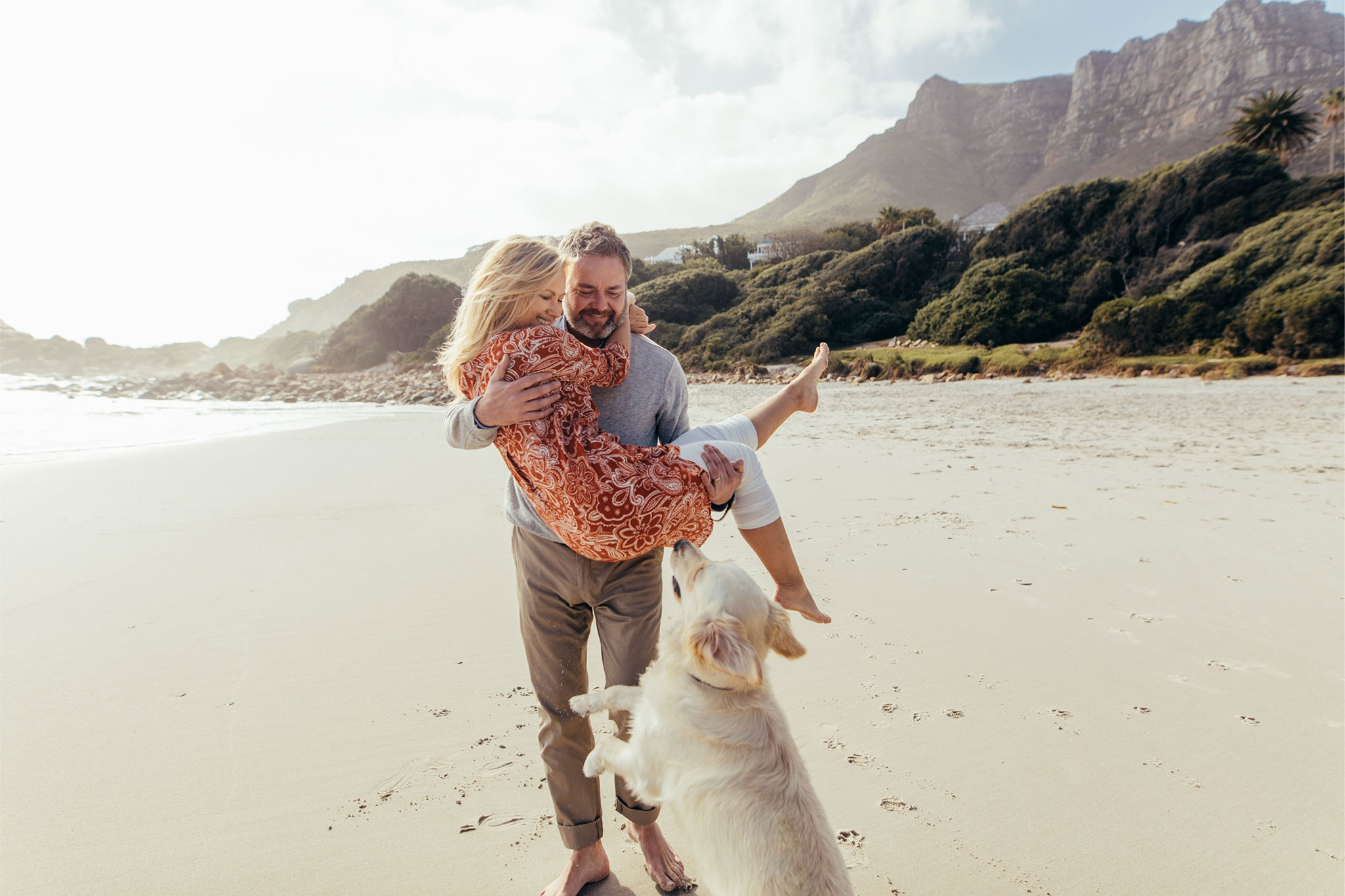 canva-romantic-couple-with-dog-beach