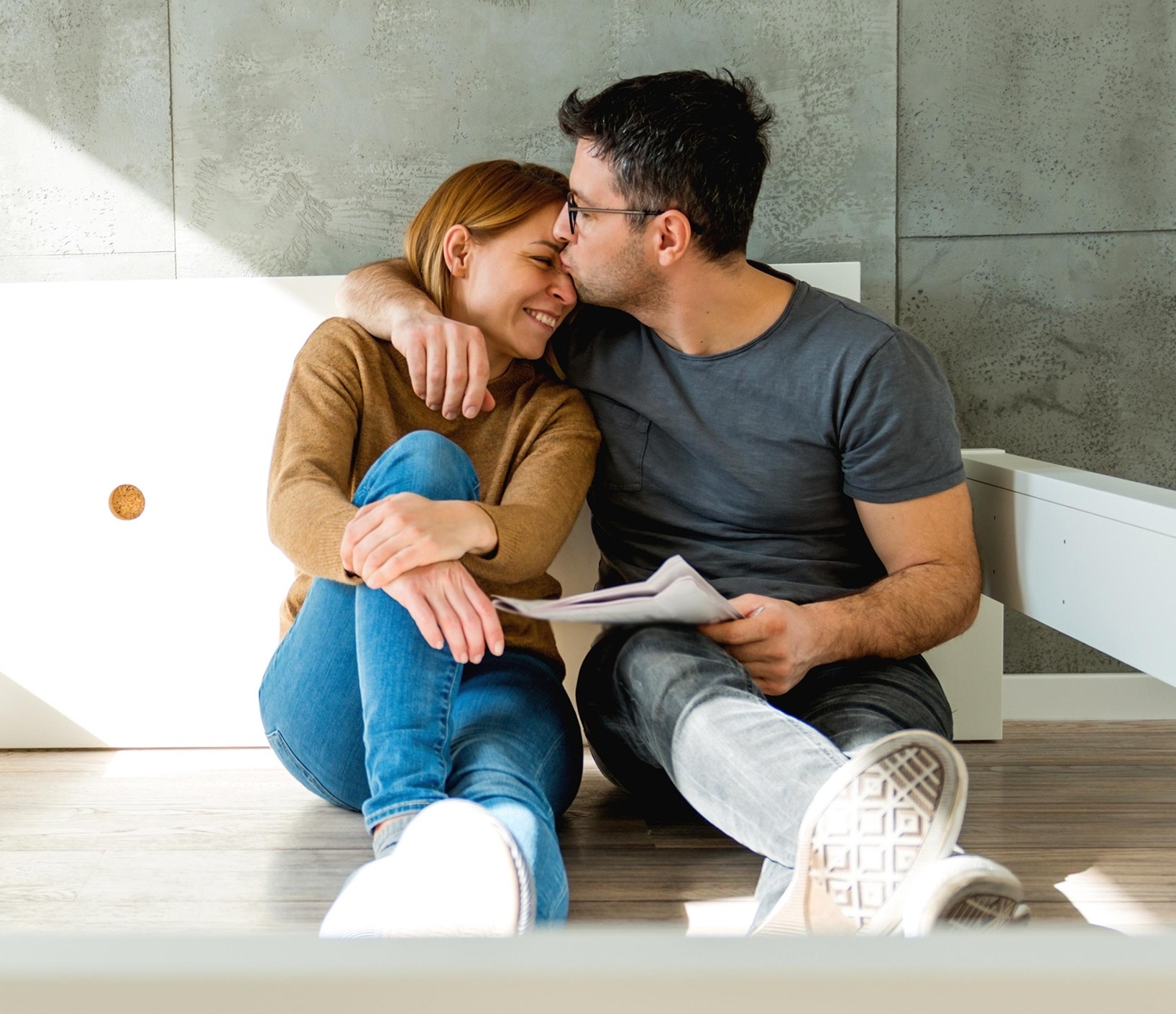 canva-young-couple-new-home