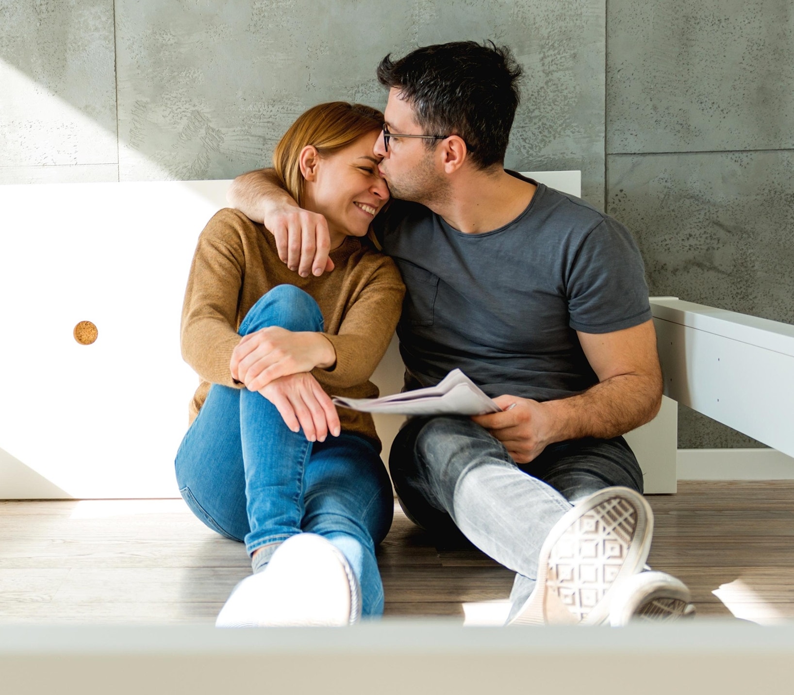 canva-young-couple-new-home