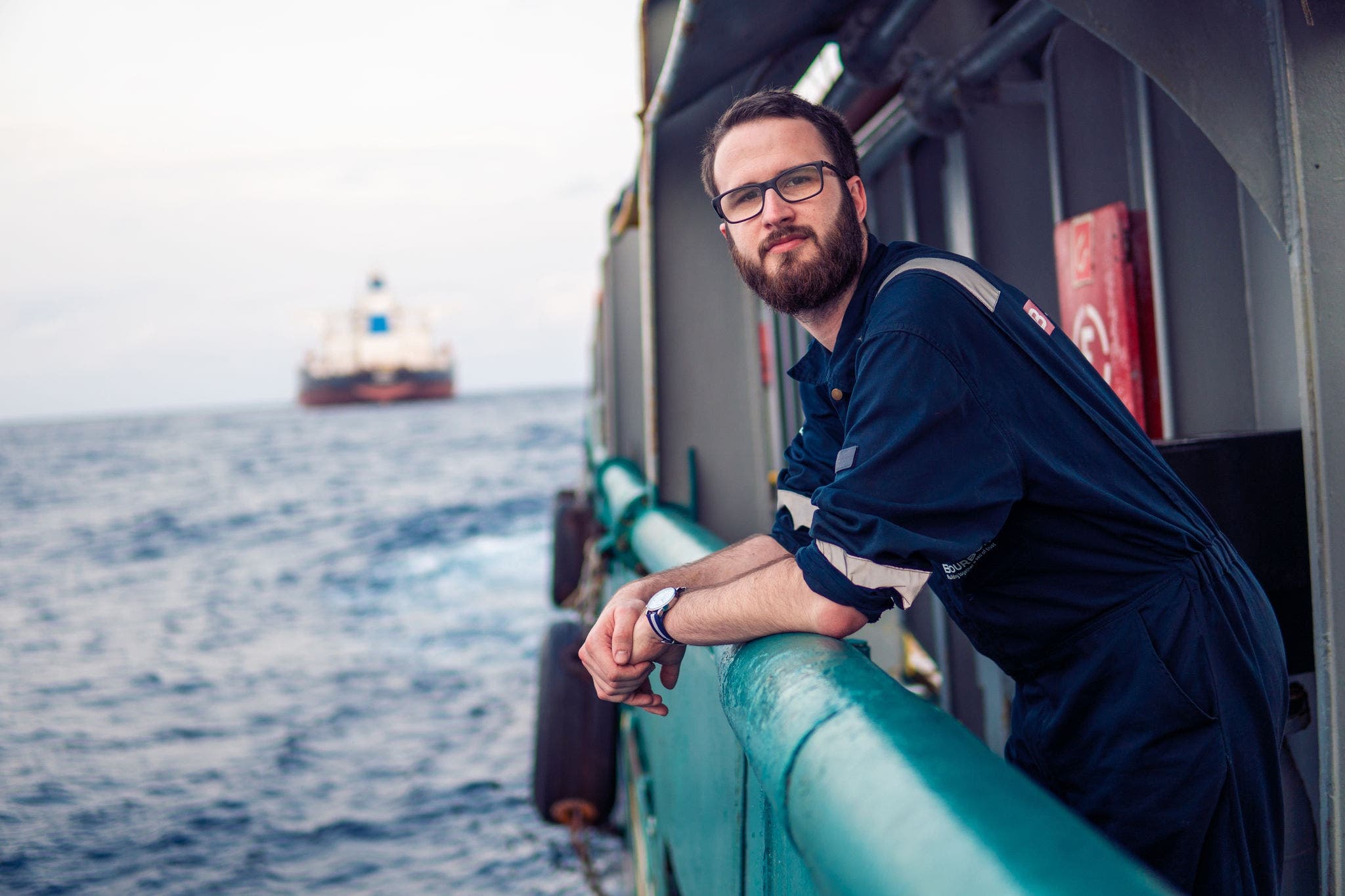 A worker at the port by the sea