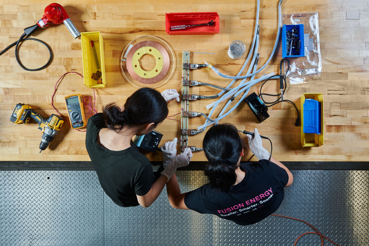 Female working with tools on benchspace