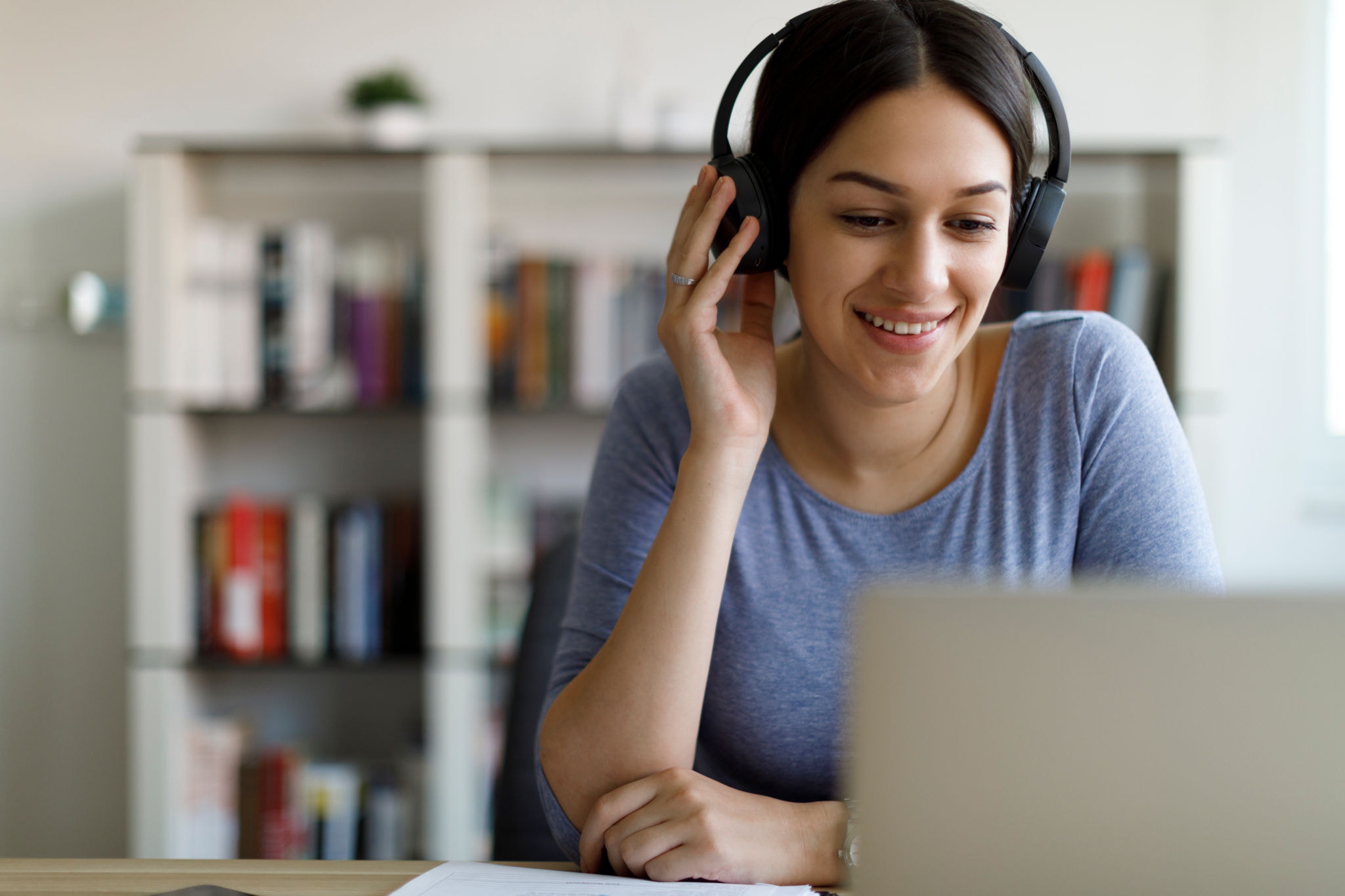 Smiling woman having video call