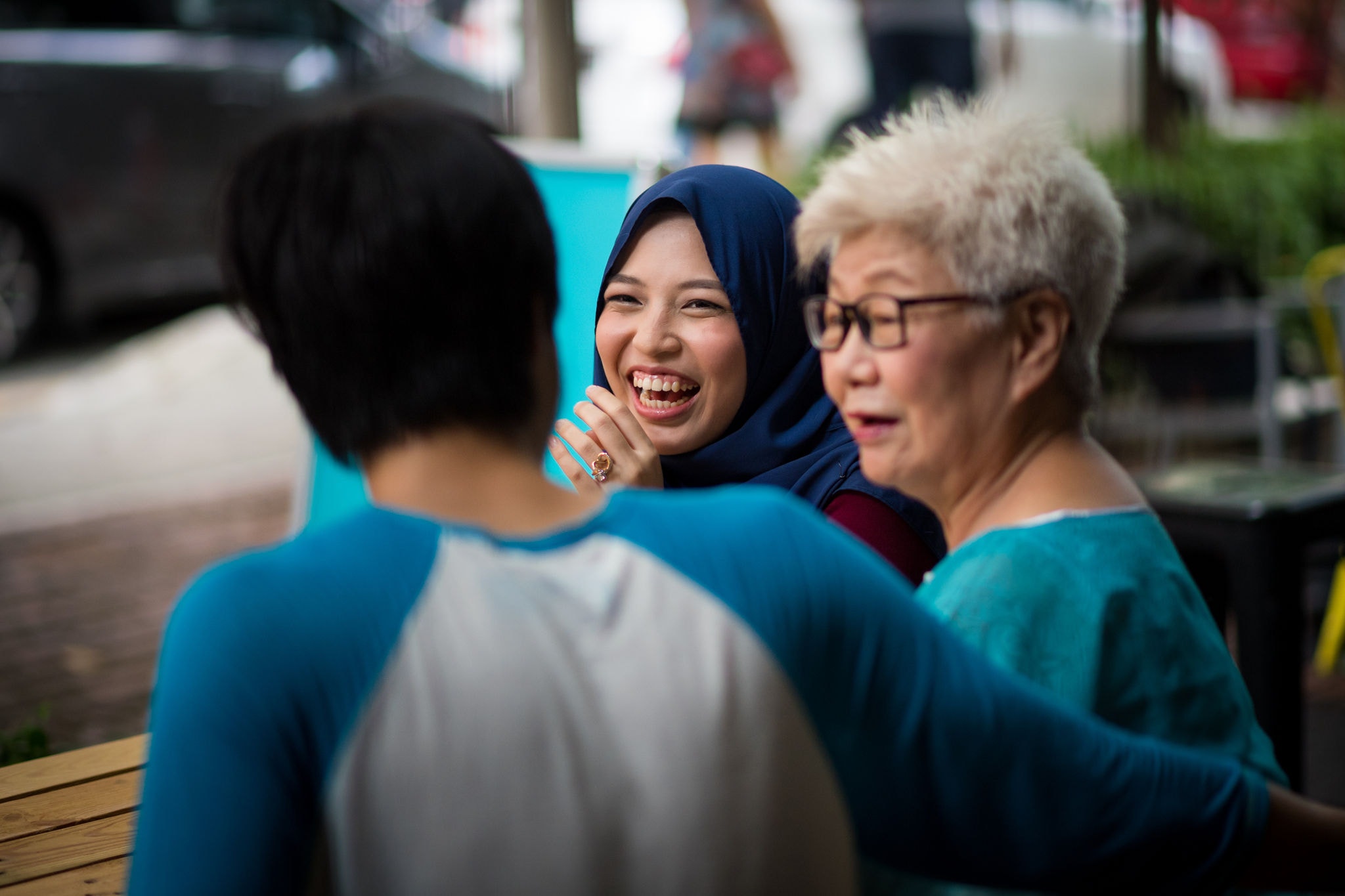 Family and friends catching up at a cafe