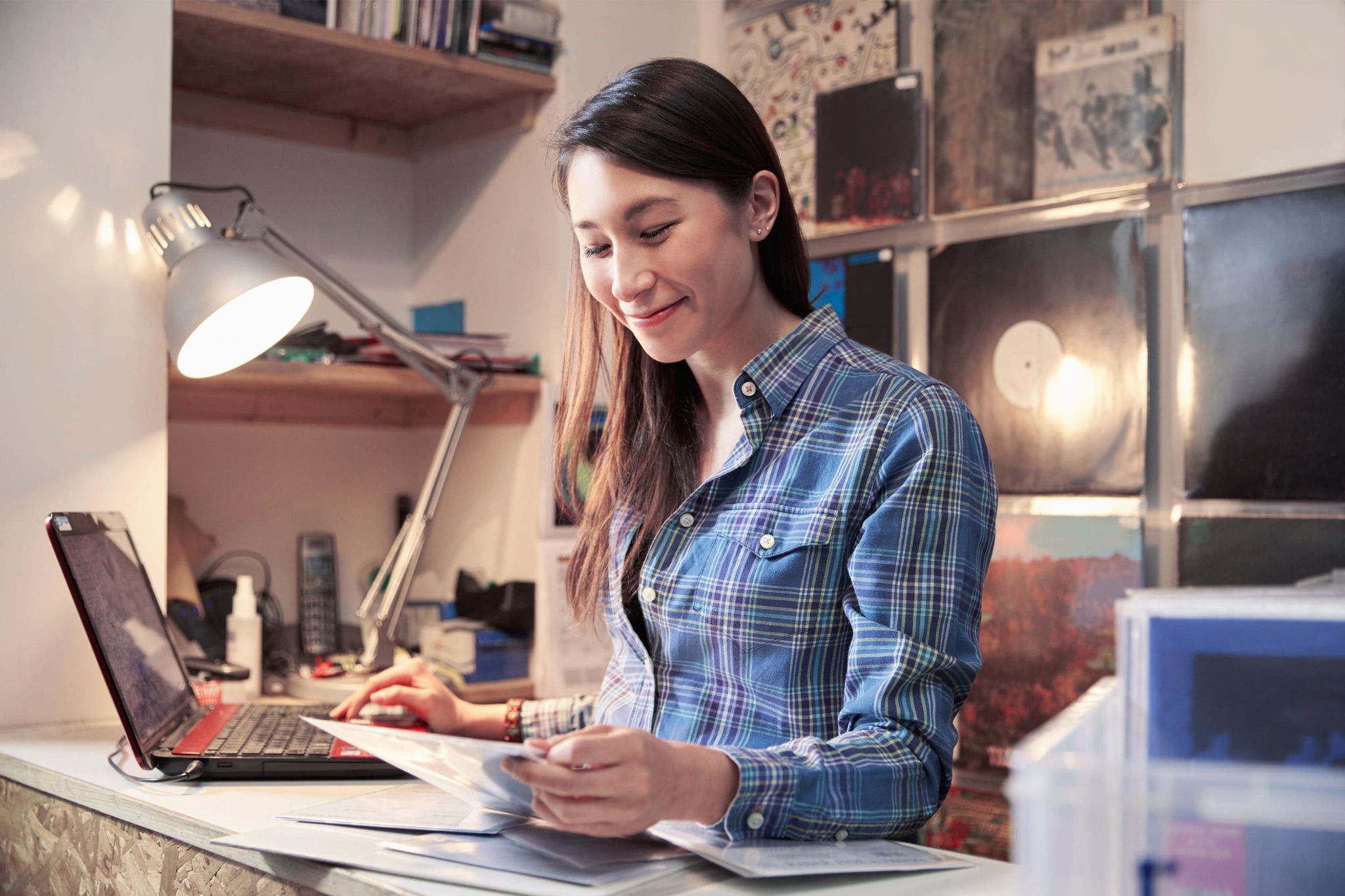 canva-young-woman-working-counter-laptop