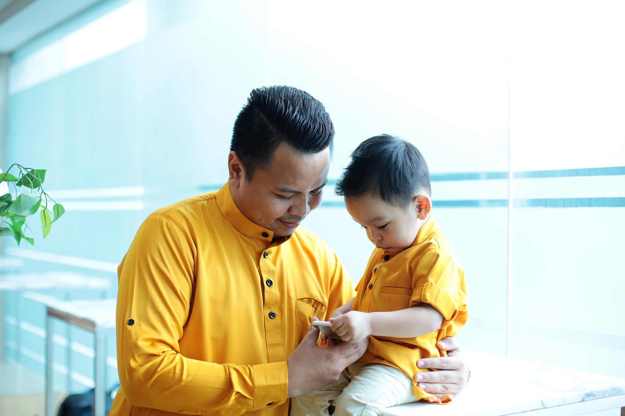 Canva-beneficiary-father-son
