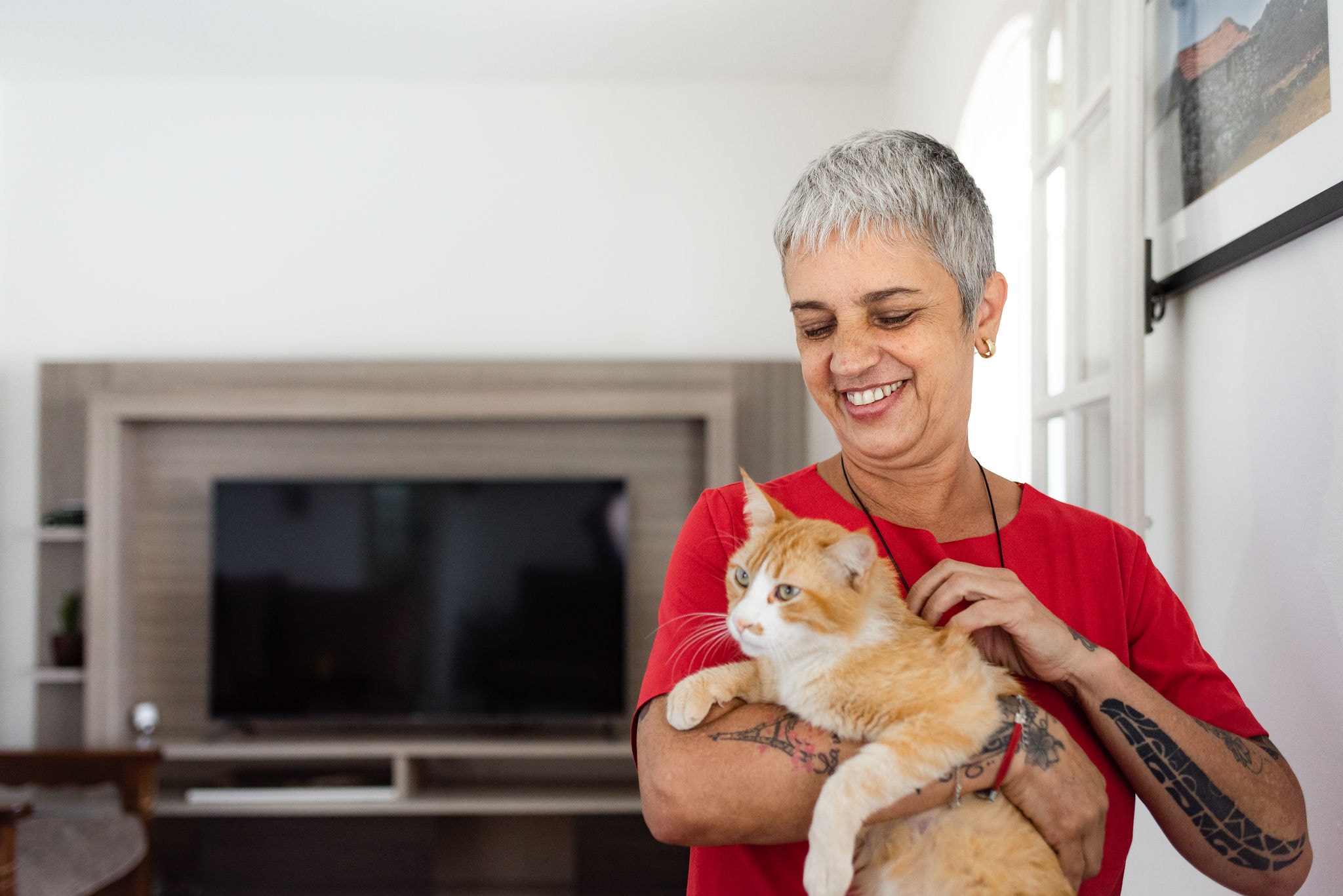 Happy senior woman enjoying relaxed moments at home